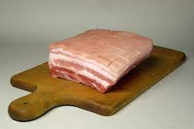 a pork cut on a chopping board